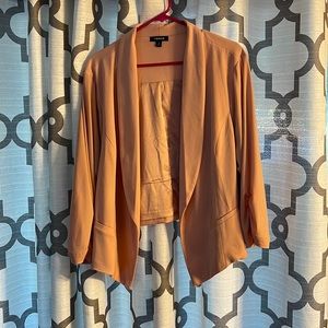 Torrid light pink asymmetrical blazer with rouched 3/4 sleeves. Only worn once.